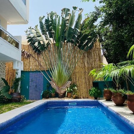 L'Oasis Guesthouse Cotonú Exterior foto